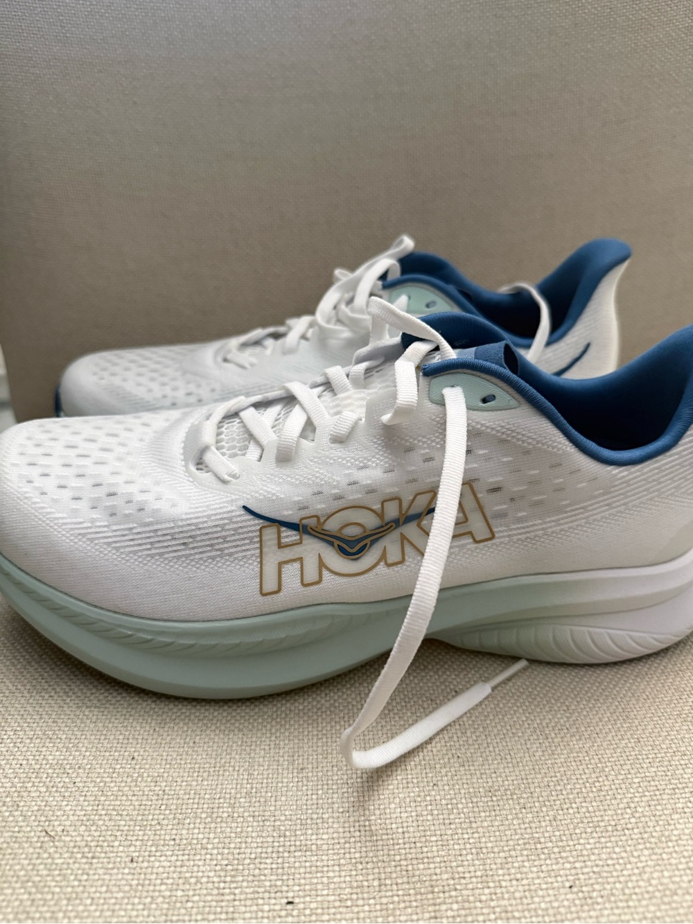 Hoka Women's White Running Shoes with Blue Lining and Mint Midsole